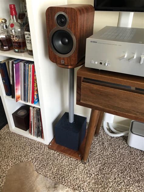 Assemble the stand with an adjustable shelf in the lower storage area instead of the dividers to accommodate your unique storage needs. . Ikea floor speaker stands